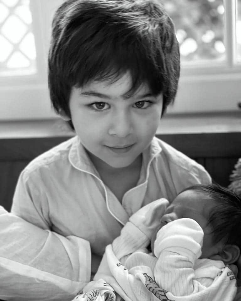 Taimur holds baby brother Jeh