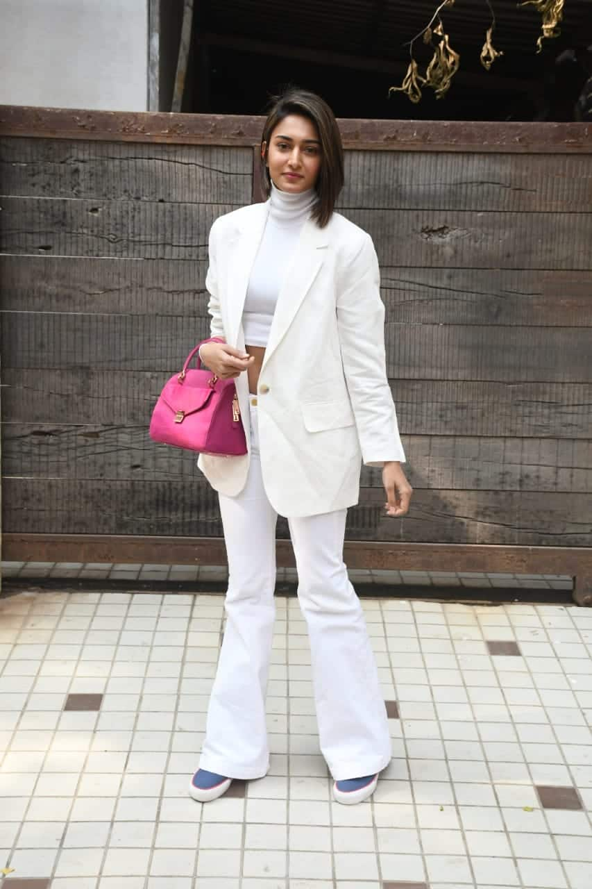 Erica adds pop of colour with her handbag