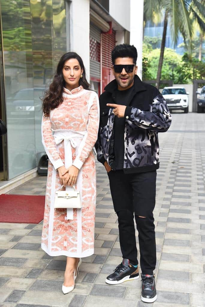 Nora Fatehi poses with Guru Randhawa