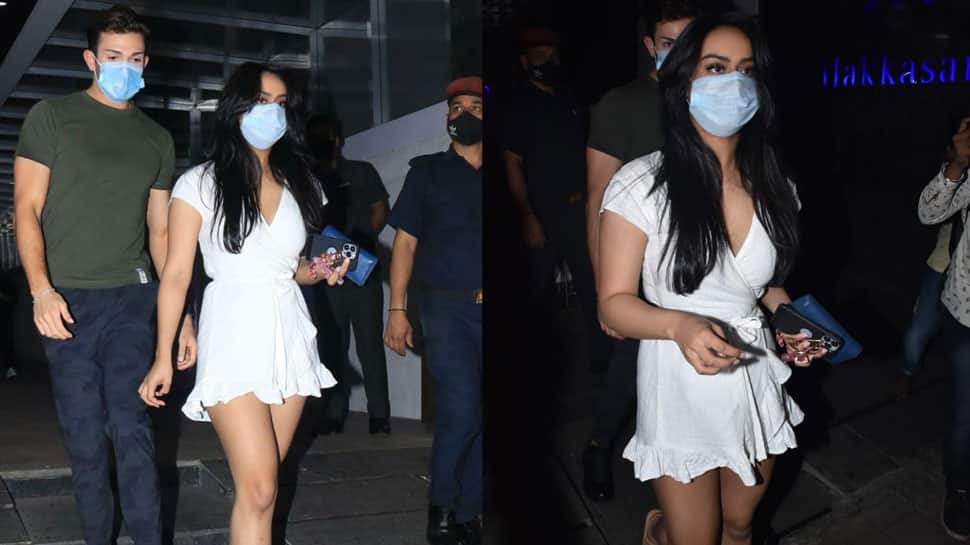 Ajay Devgn&#039;s daughter Nysa steps out in a short white skater dress on a dinner date - Watch
