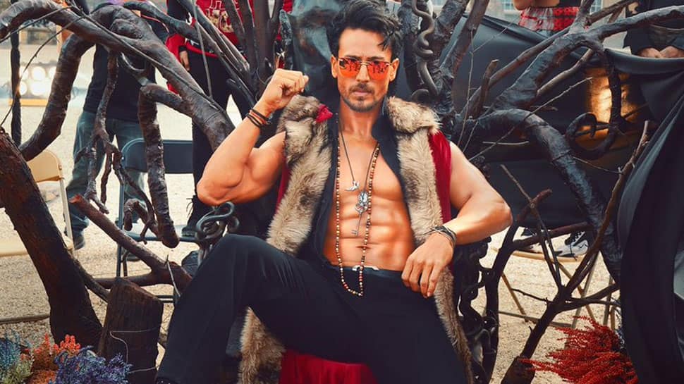 Tiger Shroff teases chiselled six-pack abs in Heropanti 2 FIRST LOOK, action star to break luxury cars Lamborghini and Ferrari!