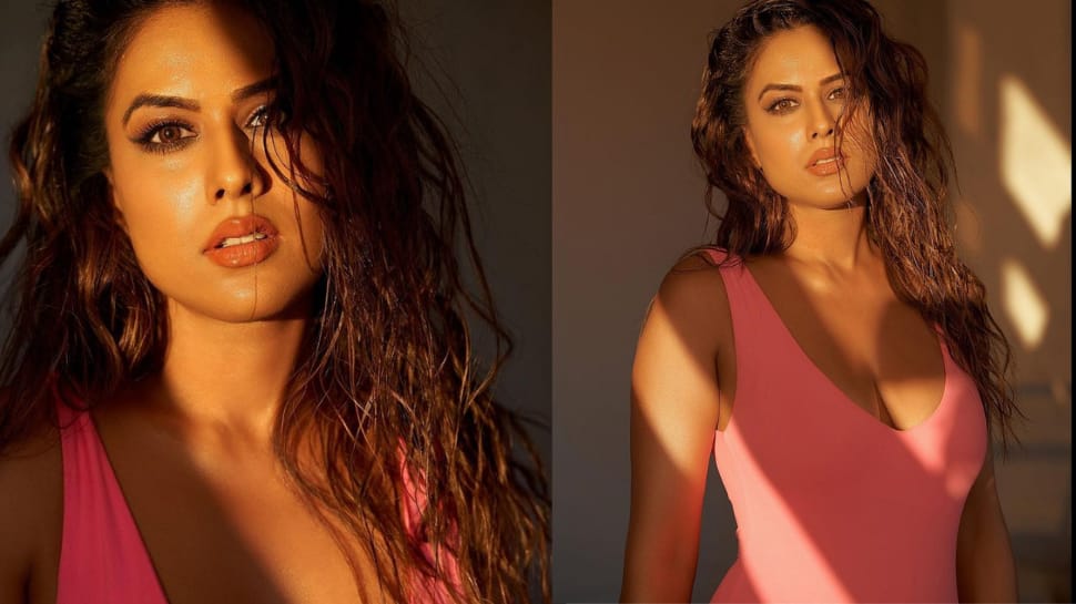 Nia Sharma shares sultry sun-kissed photo in a pink monokini, Nisha Rawal asks, ‘How so hot’