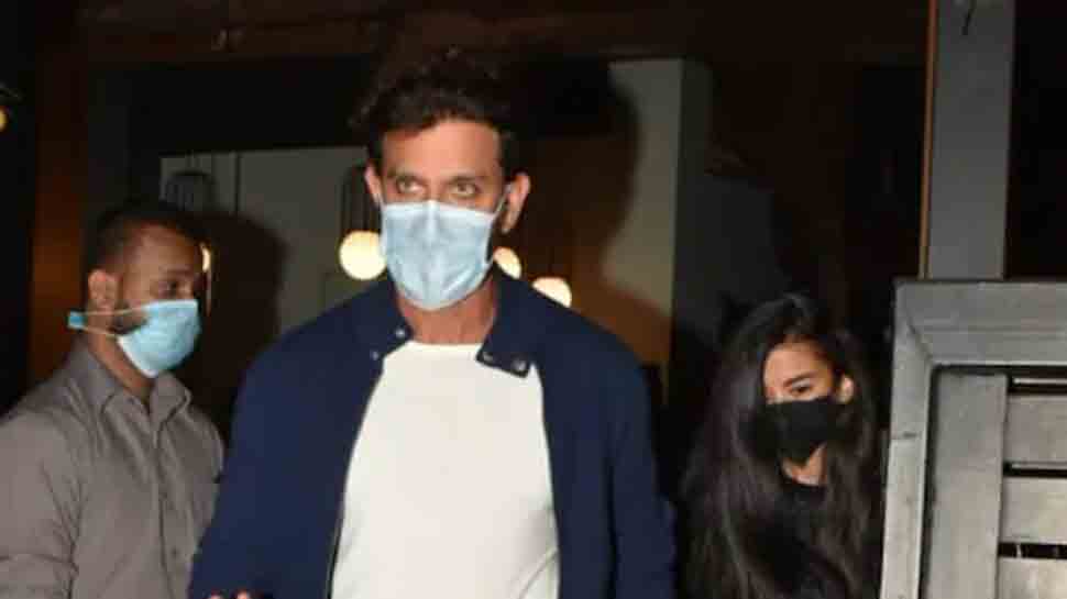 Hrithik Roshan spotted walking hand-in-hand with mystery girl outside restaurant, helps her get inside car: Watch