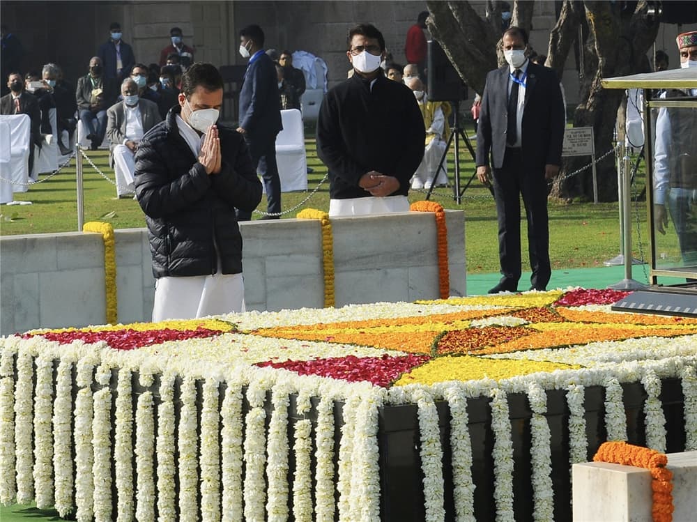 Rahul Gandhi paying respects to Mahatma Gandhi at Raj Ghat.