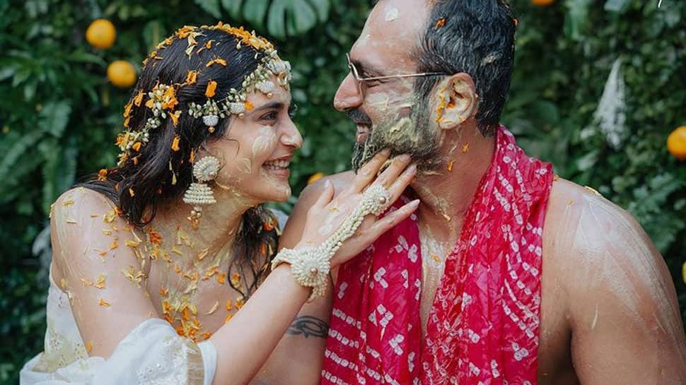 Karishma Tanna, beau Varun Bangera share a passionate kiss at Haldi ceremony, twin in dreamy pastels - Watch