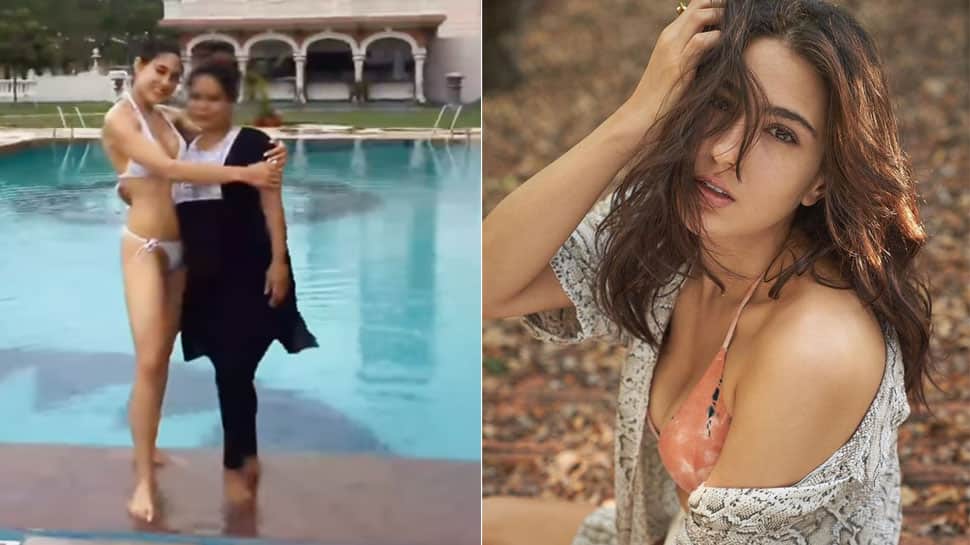 970px x 545px - Sara Ali Khan BRUTALLY trolled for pushing her spot girl into pool,  netizens call it 'disgusting' | People News | Zee News
