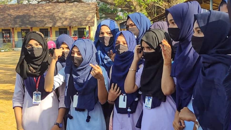 Amid row over Hijab, Karnataka bans clothes that disturb harmony, public  order in educational institutions | Karnataka News | Zee News