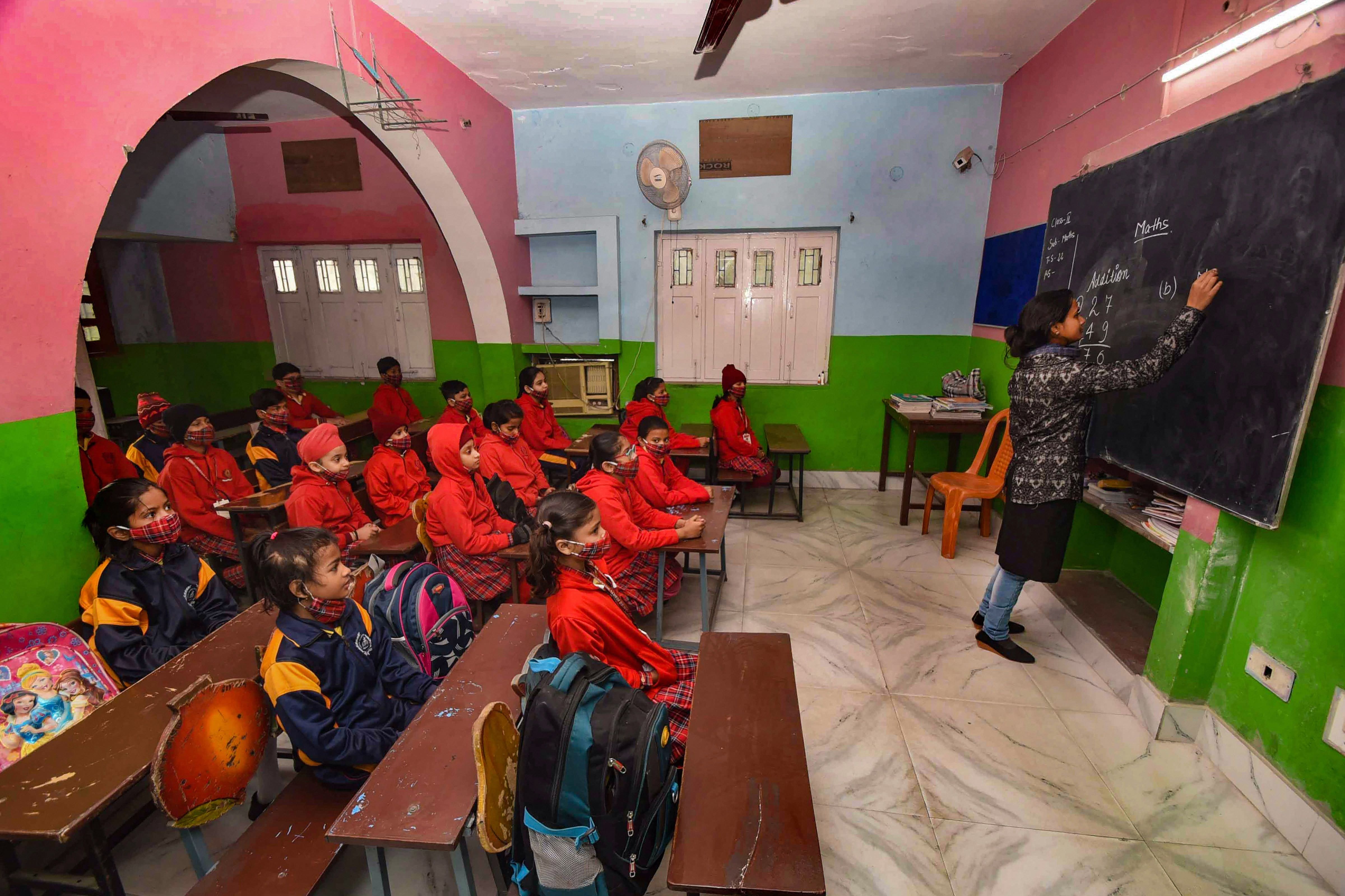 Students attend a class in Bihar