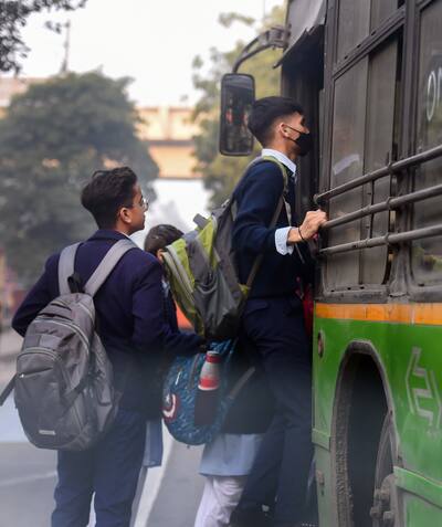 Students board a DTC bus in Delhi