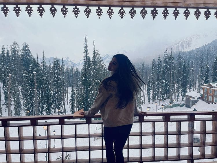 Mouni enjoy reading a book and the gorgeous view on her honeymoon