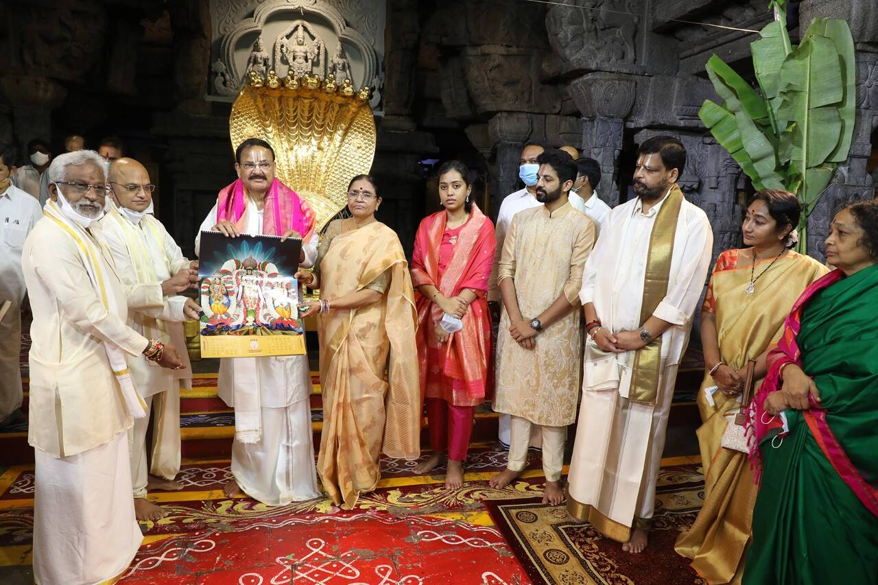 VP being presented with Thirtha Prasadams, calendar, diary by TTD Chairman