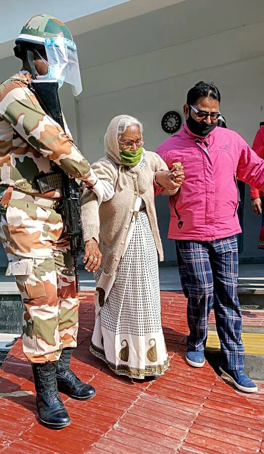Elderly voter casting her vote in Uttar Pradesh.