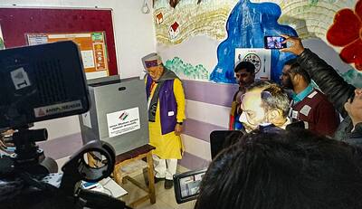 UP Finance Minister Suresh Kumar Khanna casts his vote.