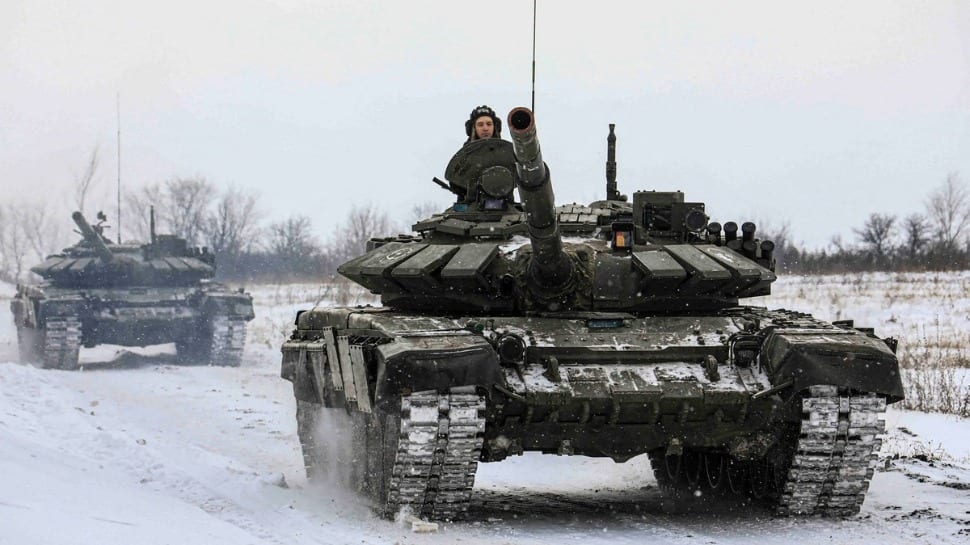 Russia shows signs of easing Ukraine tensions, posts video showing tanks leaving Crimea