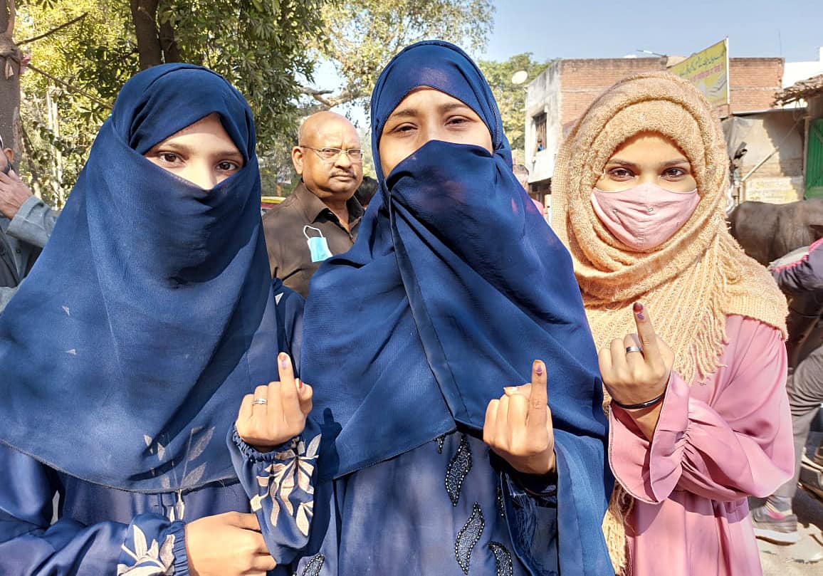 First time voters show their inked fingers in Kanpur