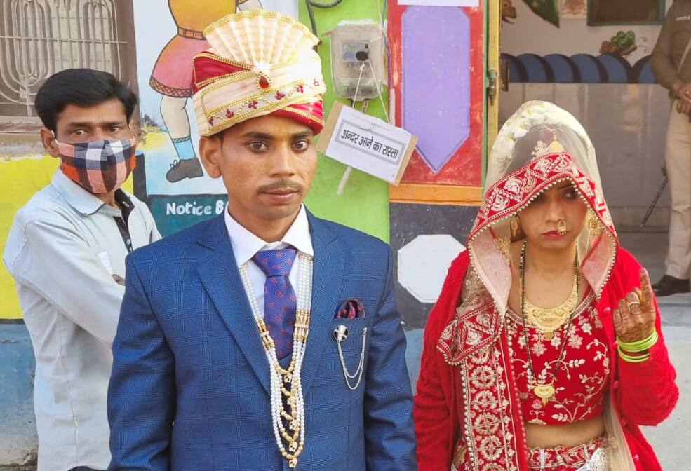 Newlywed couple caste vote in Uttar Pradesh's Firozabad.