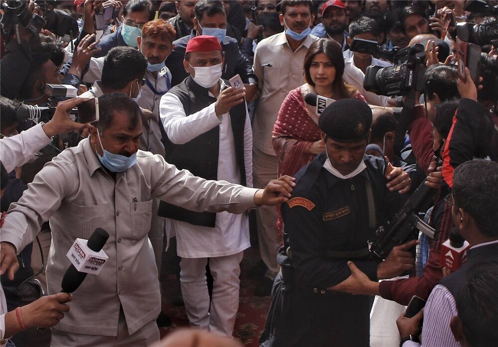 Akhilesh Yadav with wife Dimple Yadav after casting his vote in Saifai.