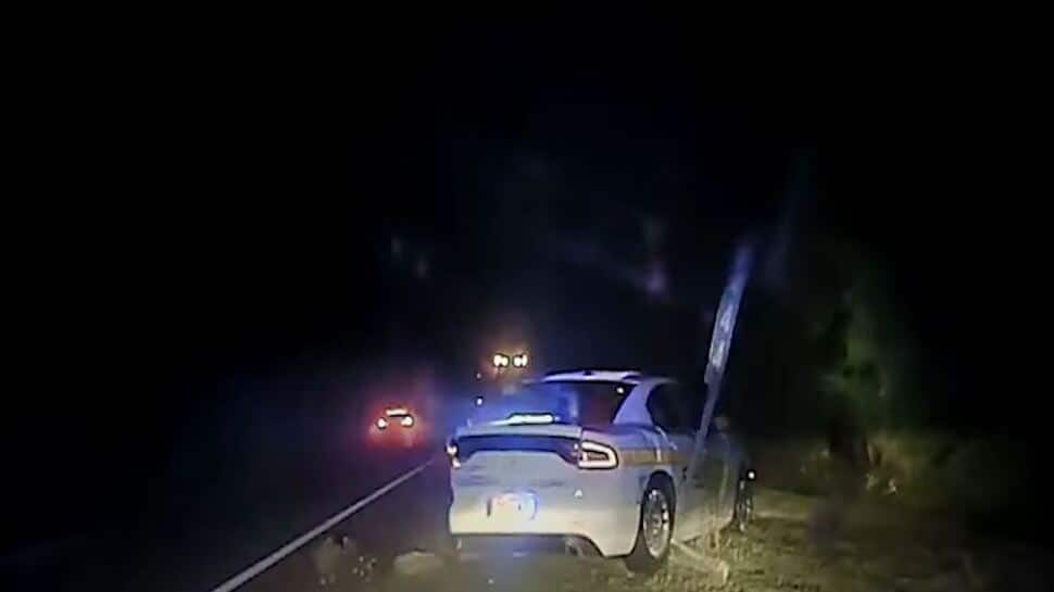 WATCH: Tesla on autopilot nearly kills 2 cops while driver views video on phone