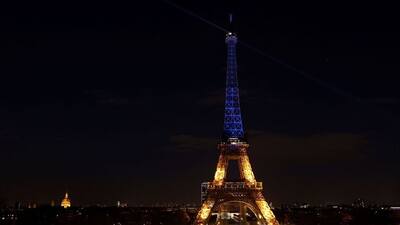 Eiffel Tower lit up in national colours of Ukraine
