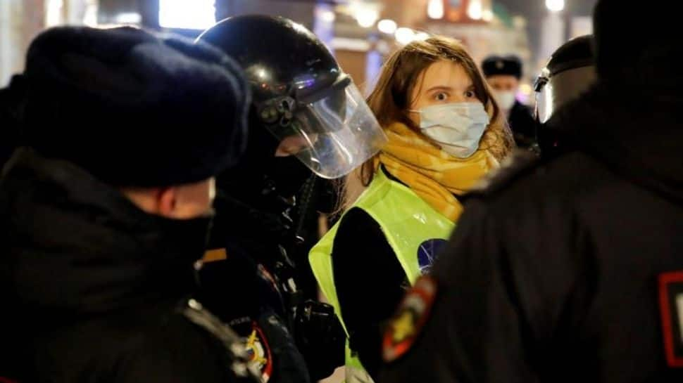 Russian law enforcement officers detain person protesting in Saint Petersburg