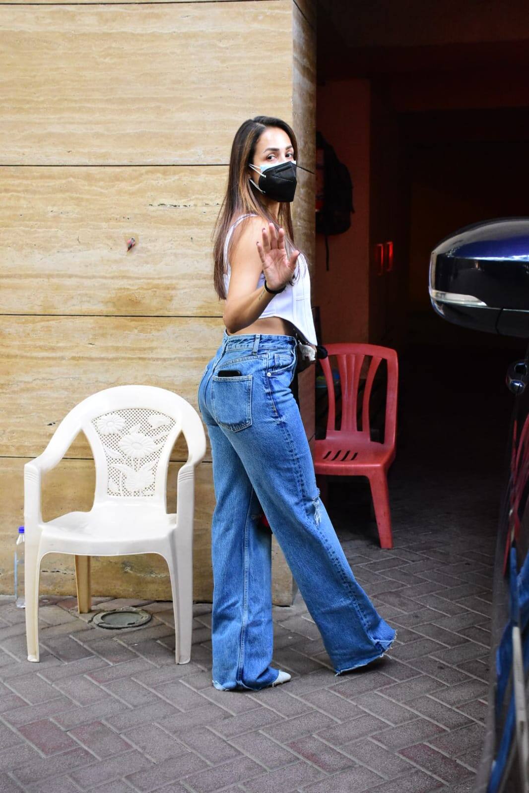 Malaika Arora looks ultra chic in white crop top and bell-bottom jeans: In  Pics, News