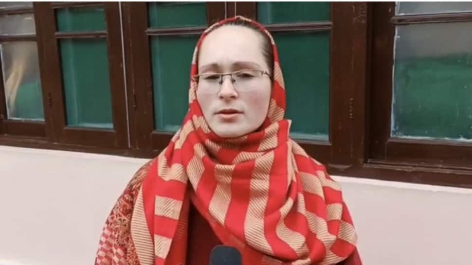 Ukrainian woman in Kashmir prays for her family