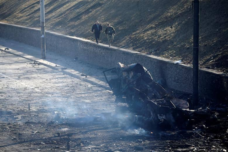 Damaged vehicle at the site of fighting in Kyiv