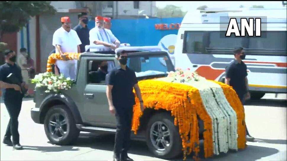 PM Narendra Modi rides India-made Mahindra Thar SUV during Ahmedabad roadshow