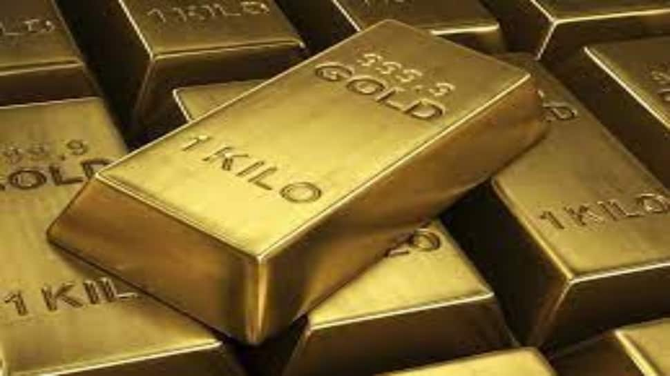 Gold dips on Putin''s comments on Ukraine talks, US rate hike bets