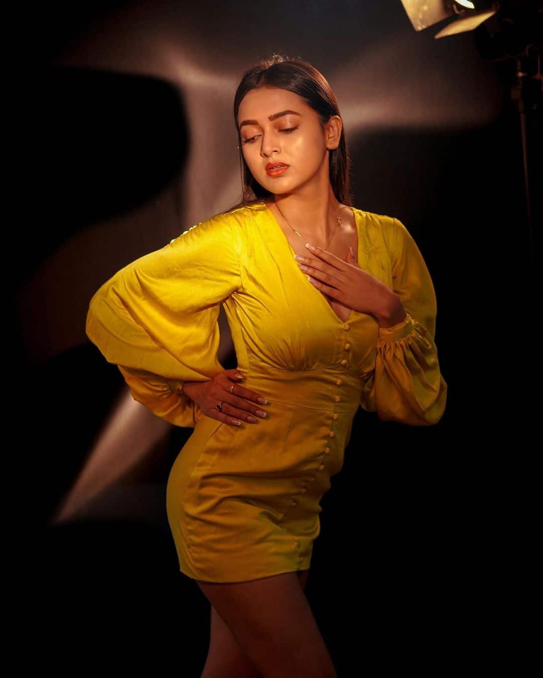 Tejasswi gives killer expressions in yellow short dress