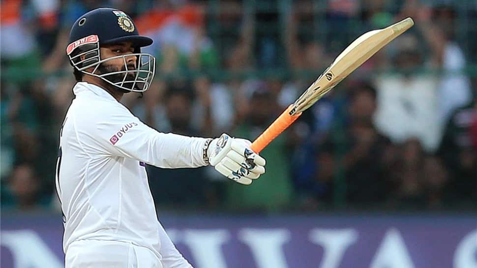 Rishabh Pant acknowledges the cheers after completing a fifty off just 28 balls on Day 2 of the India vs SL Pink Ball Test in Bengaluru. He overtook a 40-year old record of Kapil Dev, who scored a 30-ball fifty against Pakistan in 1982. (Photo: IANS)