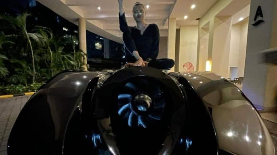 Ahmed Khan and his wife arrive in their desi swanky batmobile car at &#039;The Batman&#039; movie screening - Watch