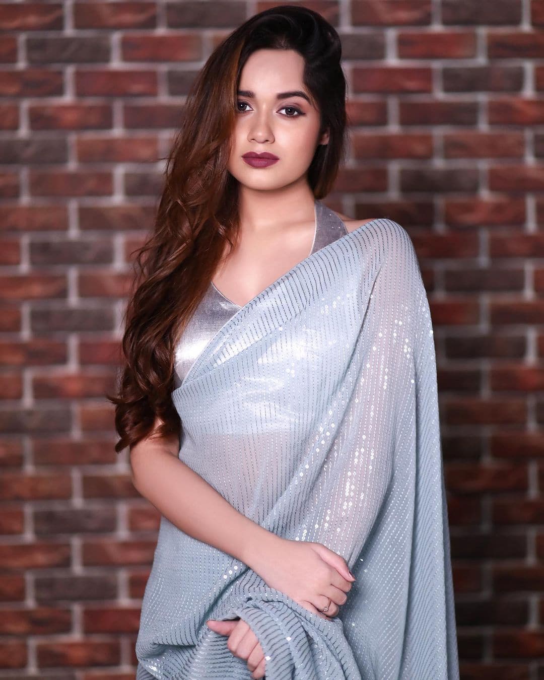 Jannat Zubair looks gorgeous in a shimmery blue saree