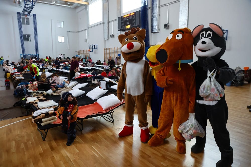 Volunteers cheer up kids and inside Ukraine refugee camp in  Przemysl