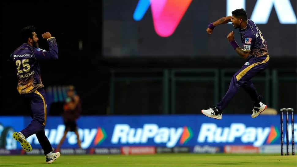 KKR pacer Umesh Yadav (right) celebrates after picking up a wicket against CSK in the IPL 2022 opener. Yadav has now taken the third-most wickets (47) in the powerplay in IPL history. (Photo: IANS)