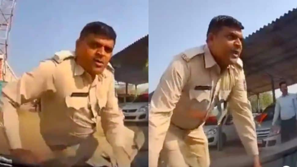 Caught on camera: Gujarat AAP leader drags cop on car bonnet, charged with ‘attempt to murder’