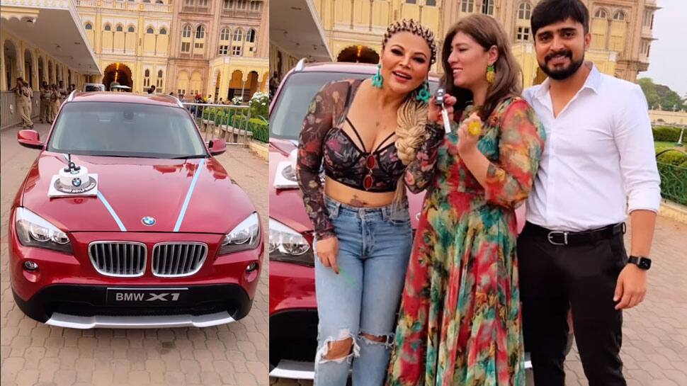 Rakhi Sawant welcomes home red hot BMW X1 worth Rs 43 lakh, watch her cut a theme cake on swanky new car - Watch