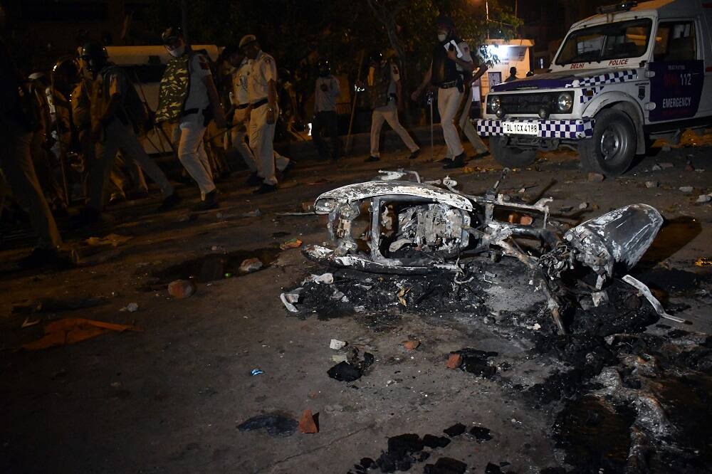 Charred vehicles at the site of Delhi's Hanuman Jayanti communal clashes