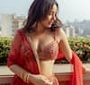 Neha Sharma paints the town red in shimmery lehenga