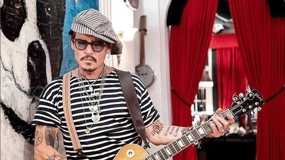 Johnny Depp back on the stand in lawsuit against ex-wife Amber Heard