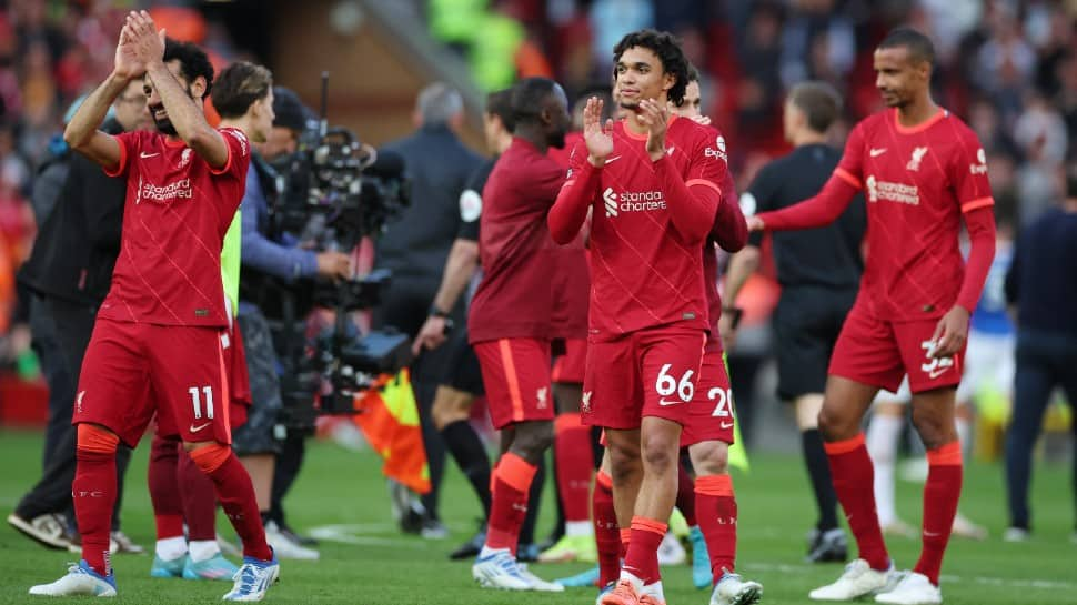 Liverpool keep pressure on Manchester City with Premier League derby win over Everton