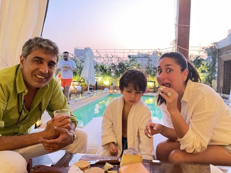 Kareena enjoys crackers and cheese by the pool