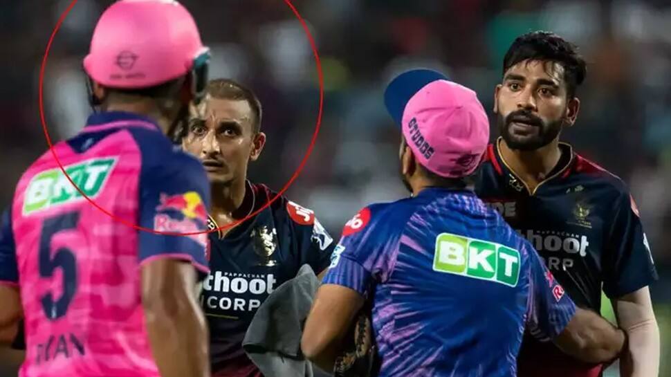 IPL 2022: Harshal Patel, Riyan Parag involved in verbal fight after RR batter smashes RCB pacer for 18 runs in last over - WATCH
