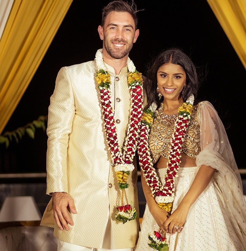 Newly weds pose for the cameras