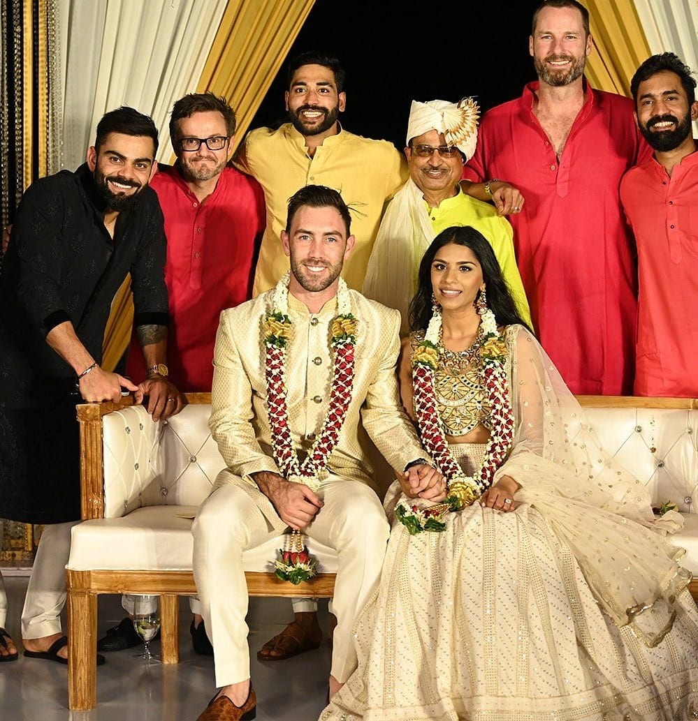 RCB teammates pose with the couple