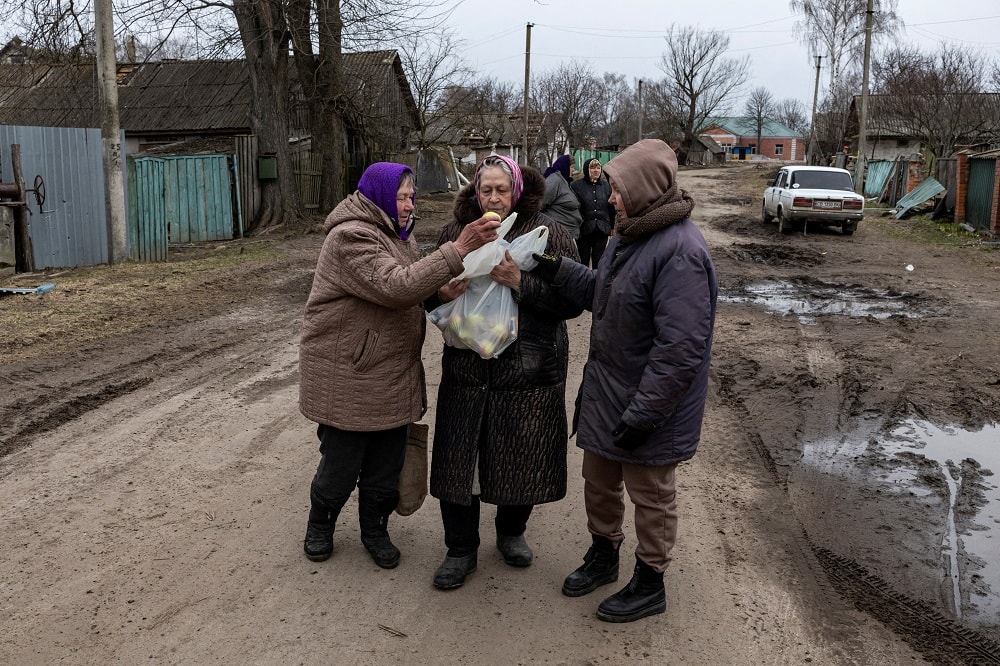 Elderly people share food in Ukraine amid war
