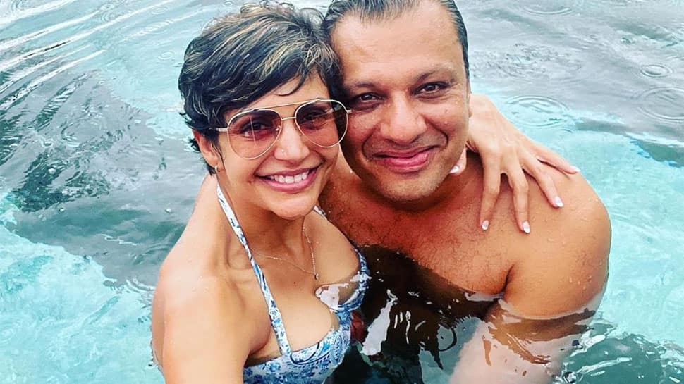 Bikini-clad Mandira Bedi gets BRUTALLY trolled for sharing pool pics with a male friend! 