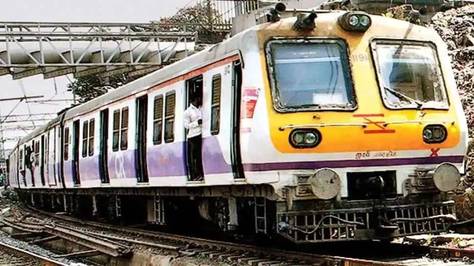 Mumbai Local train: Mumbaikars walk along tracks to reach workplaces as snag halts Western Railway route