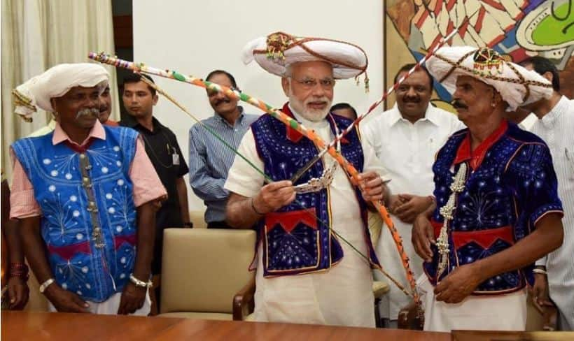 PM Modi attired in traditional dress of the tribal communities of Dahod in Gujarat