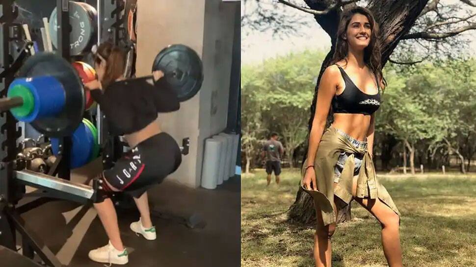 Disha Patani does deadlifts in a black sports bra, leggings and flaunts her washboard abs - Watch